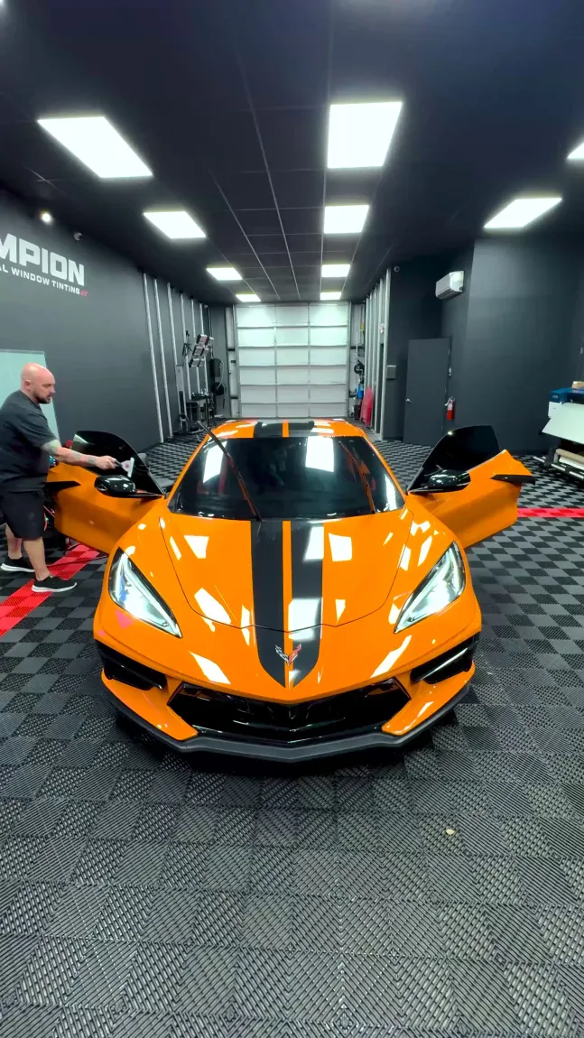 Original Champion orange sports car in shop
