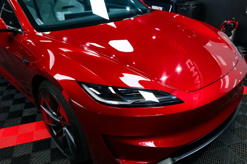 Original Champion red Tesla in shop